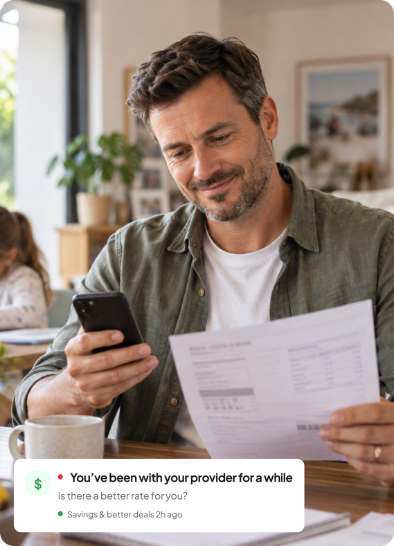 Man reading a bill on his phone with a notification asking if there is a better rate